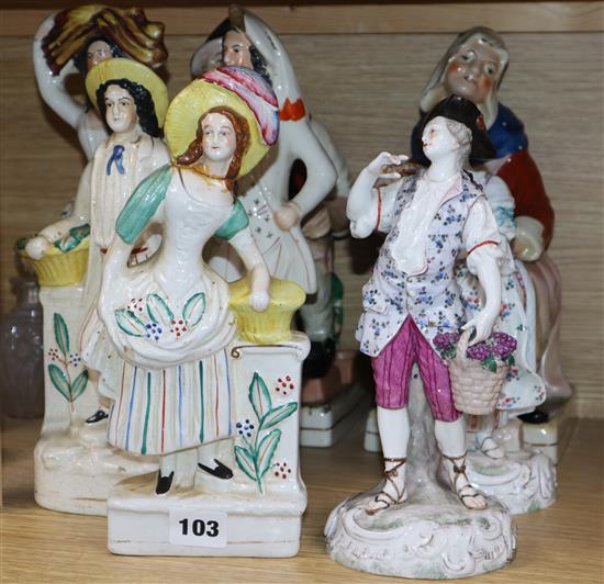 A pair of French porcelain figures and five Staffordshire figures (7)